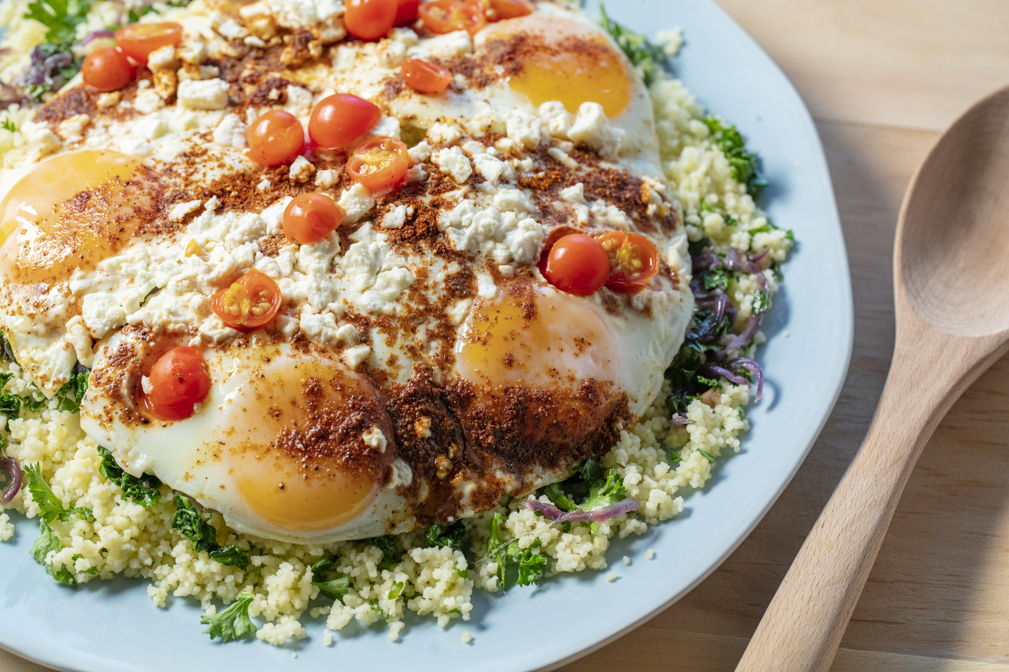 Skillet Eggs With Baharat, Kale and Feta with Lemony Parsley Couscous - Eggs.ca