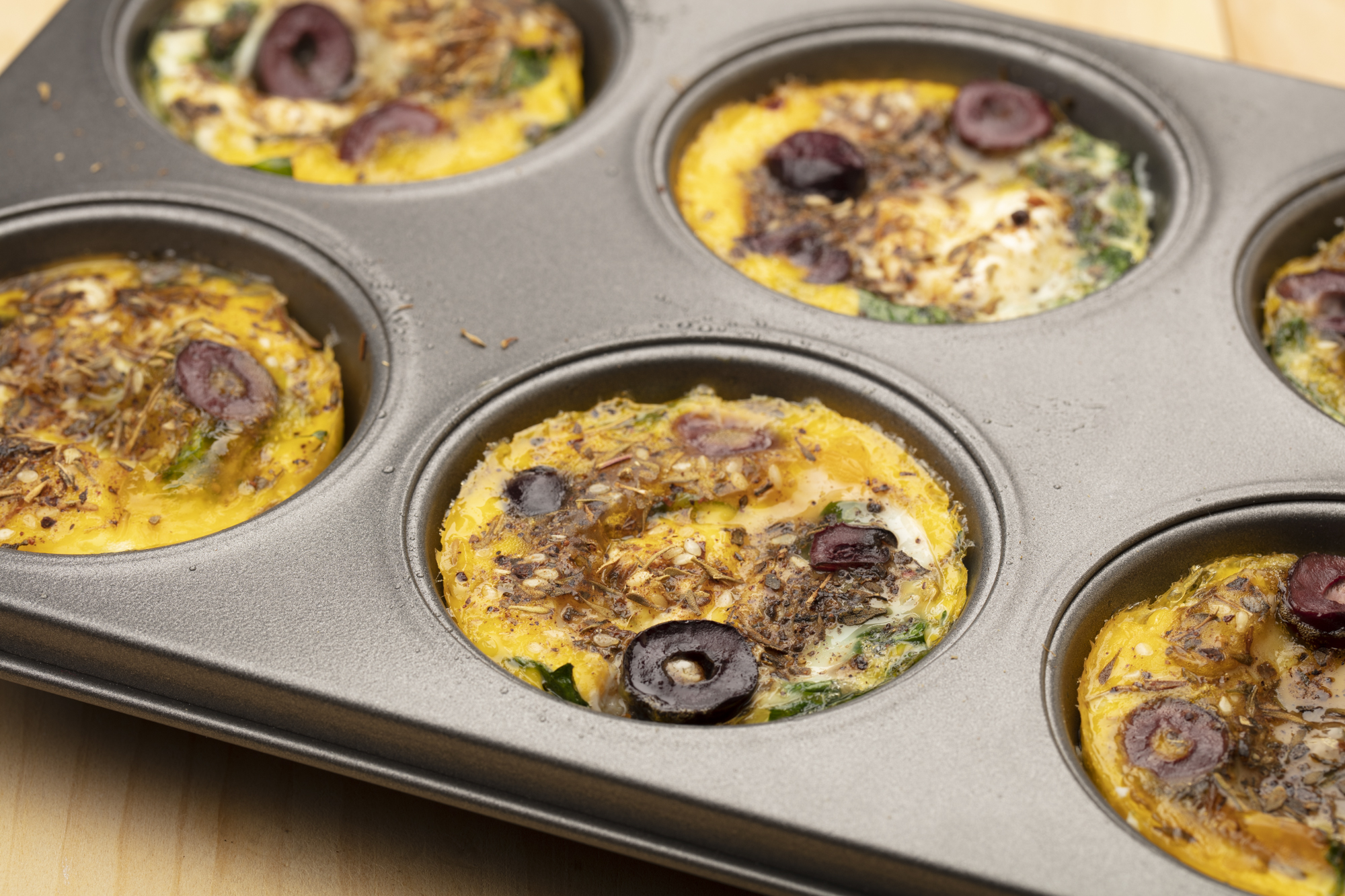 Za'atar Spiced Baked Eggs With Black Olives and Labneh - Eggs.ca